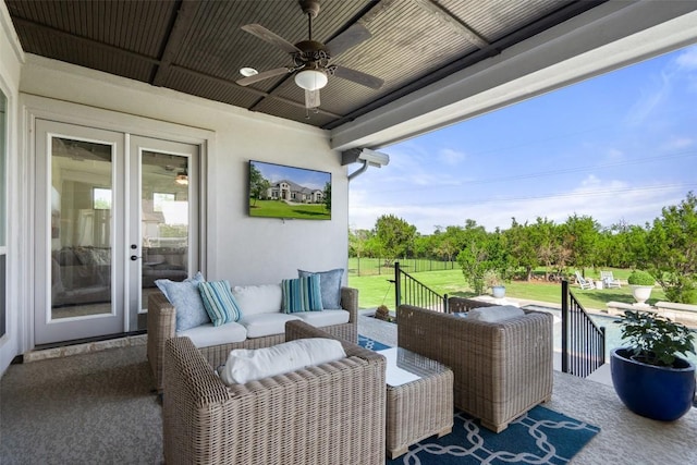 view of patio / terrace with ceiling fan and outdoor lounge area