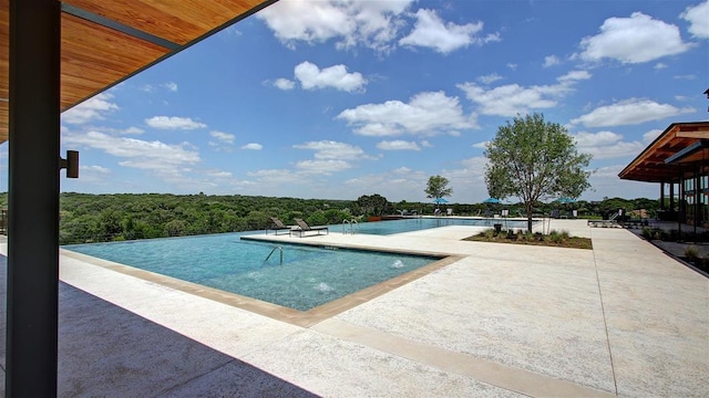 community pool featuring a patio