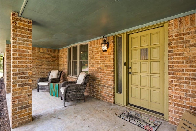 1619 Twin Island Dr, Lockhart, TX 78644 - doorway to property with brick siding and a porch