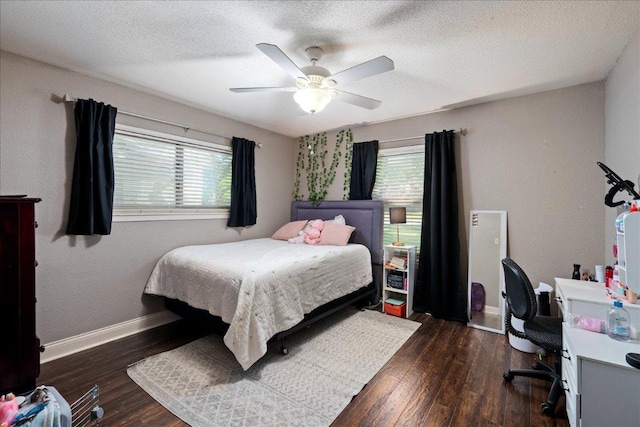 1619 Twin Island Dr, Lockhart, TX 78644 - bedroom featuring a desk, baseboards, wood finished floors, a ceiling fan, and a textured ceiling