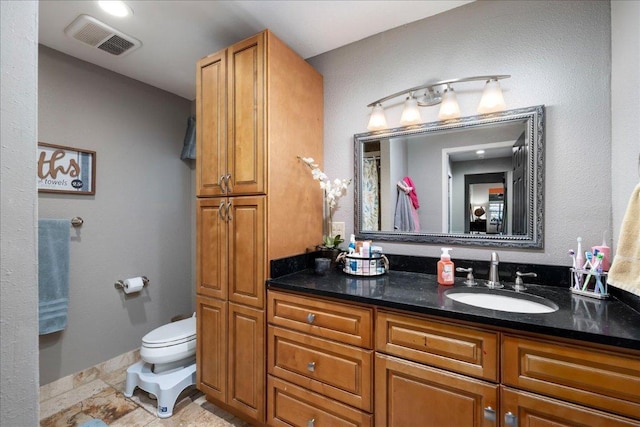 1619 Twin Island Dr, Lockhart, TX 78644 - bathroom with toilet and vanity
