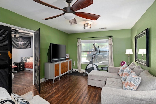 1619 Twin Island Dr, Lockhart, TX 78644 - living area with wood finished floors, ceiling fan, and baseboards