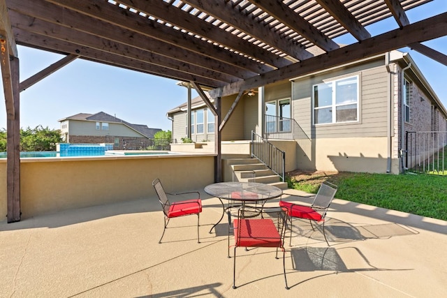 view of patio featuring outdoor dining area, a pergola, fence, and stairway