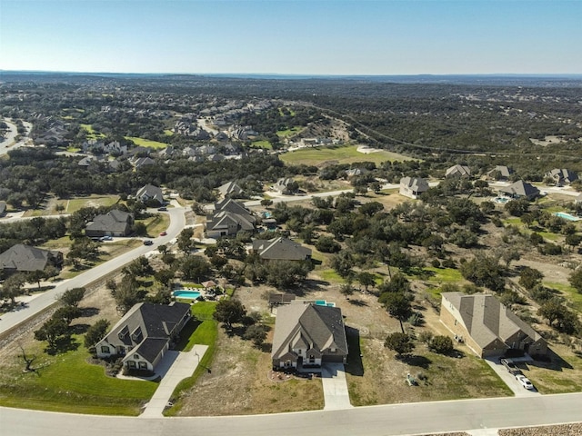 aerial overview of property's location with nearby suburban area