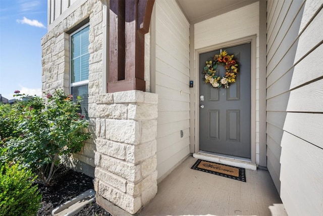 651 Bayberry Cir, Buda, TX 78610 - view of exterior entry with stone siding