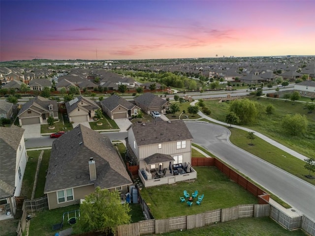 651 Bayberry Cir, Buda, TX 78610 - aerial view at dusk of a residential view