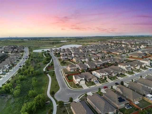 651 Bayberry Cir, Buda, TX 78610 - aerial view at dusk of a water view and a residential view