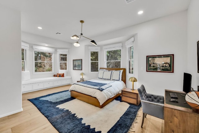 3204 Aztec Fall Cv, Austin, TX 78746 - bedroom with wood finished floors and recessed lighting