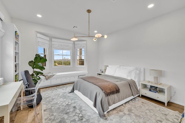 3204 Aztec Fall Cv, Austin, TX 78746 - bedroom with light wood-type flooring and recessed lighting