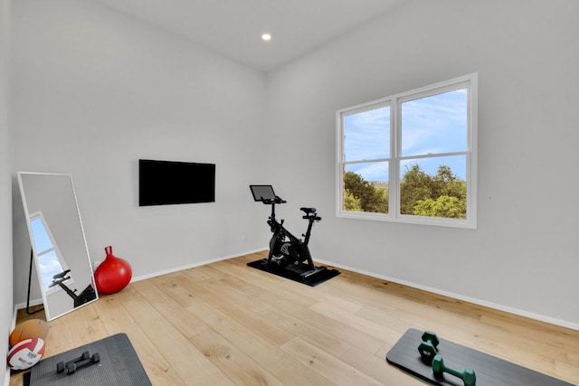 3204 Aztec Fall Cv, Austin, TX 78746 - exercise area featuring plenty of natural light, wood-type flooring, baseboards, and recessed lighting