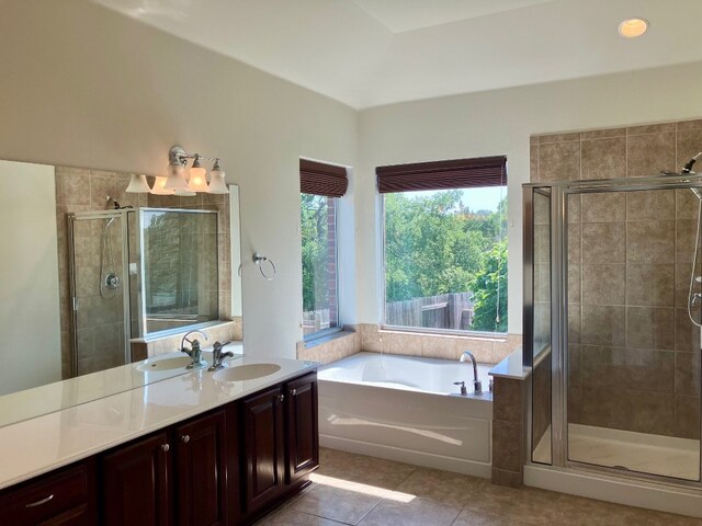209 Country Creek Dr, Austin, TX 78737 - full bathroom featuring tile patterned flooring, a bath, vanity, and a stall shower
