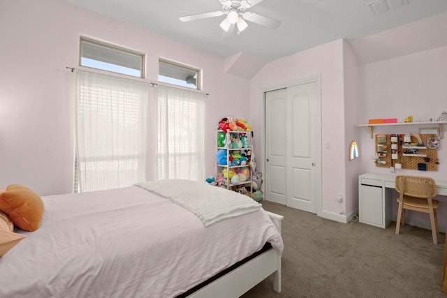 bedroom with carpet floors, a closet, a ceiling fan, and baseboards