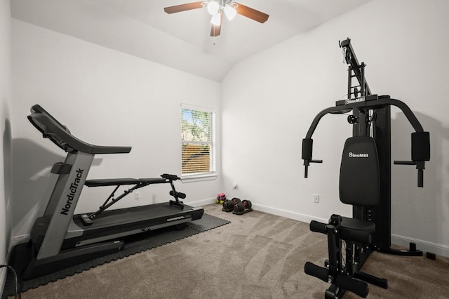 exercise room featuring baseboards, carpet flooring, a ceiling fan, and vaulted ceiling