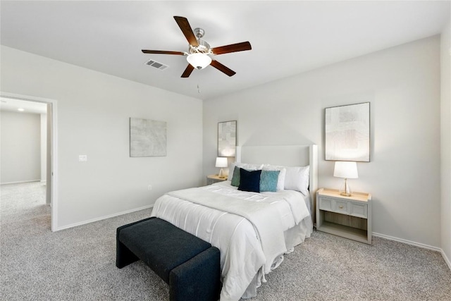 10207 Buster Dr, Austin, TX 78748 - bedroom with light carpet, baseboards, and ceiling fan