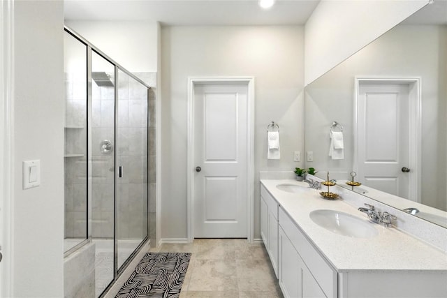 10207 Buster Dr, Austin, TX 78748 - full bathroom featuring double vanity and a stall shower