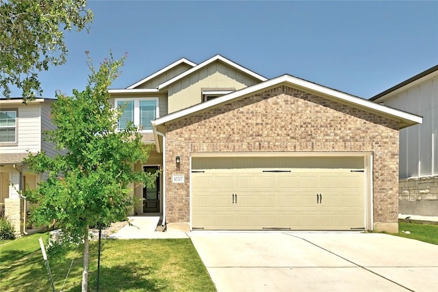 10207 Buster Dr, Austin, TX 78748 - view of front facade featuring brick siding, concrete driveway, a garage, and board and batten siding