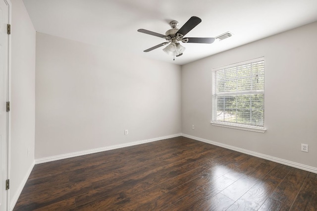 701 Stansted Manor Dr, Pflugerville, TX 78660 - unfurnished room featuring ceiling fan, dark wood finished floors, and baseboards