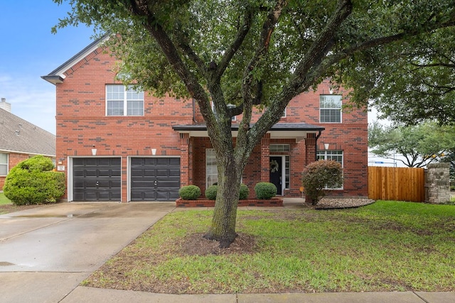701 Stansted Manor Dr, Pflugerville, TX 78660 - traditional home with an attached garage, brick siding, and driveway