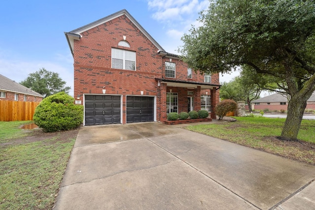 701 Stansted Manor Dr, Pflugerville, TX 78660 - view of front of home with brick siding, driveway, and an attached garage