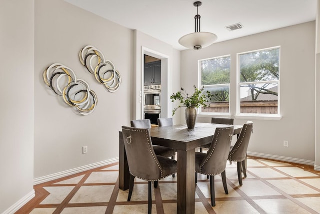 701 Stansted Manor Dr, Pflugerville, TX 78660 - dining room with inlaid floor details