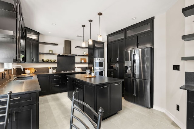 701 Stansted Manor Dr, Pflugerville, TX 78660 - kitchen featuring appliances with stainless steel finishes, open shelves, dark cabinets, a sink, and dark countertops