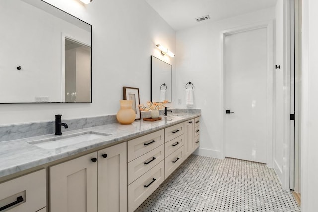1908 Goodrich Ave Unit B, Austin, TX 78704 - bathroom with double vanity and tile patterned floors