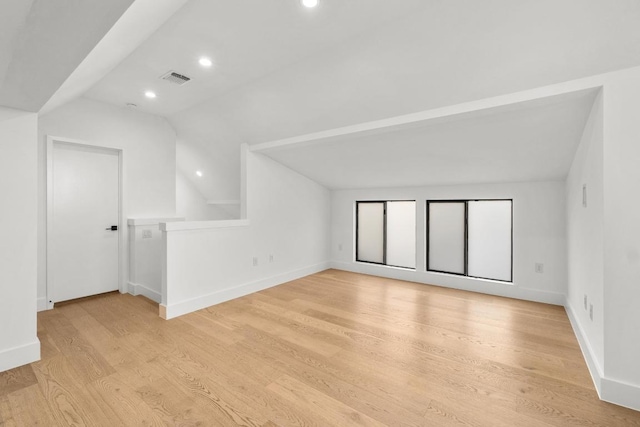 1908 Goodrich Ave Unit B, Austin, TX 78704 - additional living space with lofted ceiling, light wood-style floors, baseboards, and recessed lighting