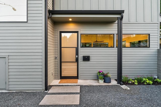 property entrance with board and batten siding