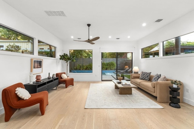 1908 Goodrich Ave Unit B, Austin, TX 78704 - living area featuring recessed lighting, healthy amount of natural light, light wood-type flooring, baseboards, and a ceiling fan