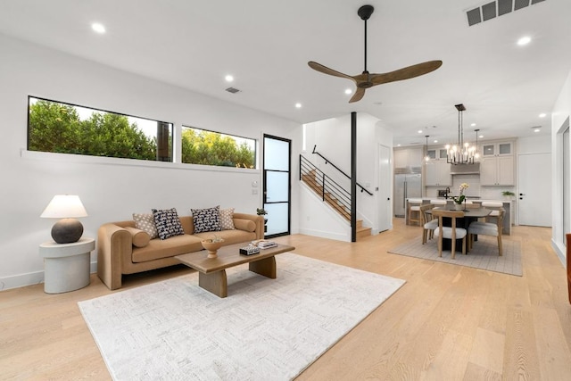 1908 Goodrich Ave Unit B, Austin, TX 78704 - living area featuring light wood-style floors, stairs, recessed lighting, a ceiling fan, and baseboards