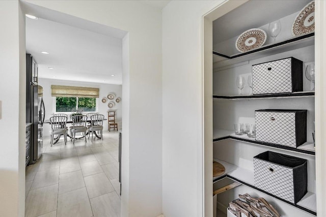 interior space with freestanding refrigerator