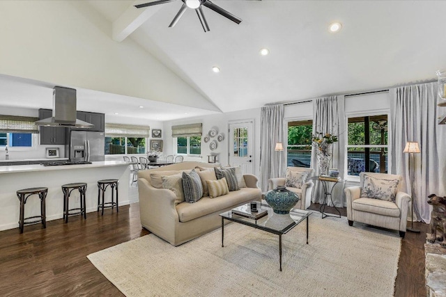 living room featuring beamed ceiling, dark wood-style floors, recessed lighting, a ceiling fan, and high vaulted ceiling