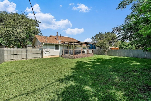 rear view of house featuring a deck