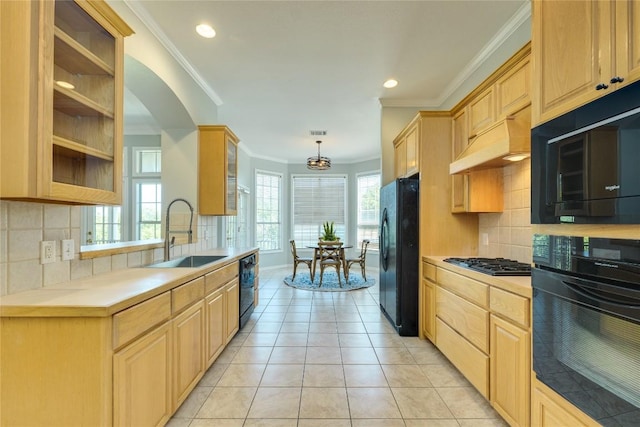 5133 Valburn Ct, Austin, TX 78731 - kitchen featuring black appliances, light brown cabinets, ornamental molding, light countertops, and backsplash