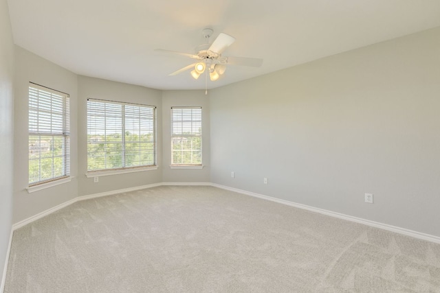 5133 Valburn Ct, Austin, TX 78731 - spare room with light carpet, plenty of natural light, and a ceiling fan
