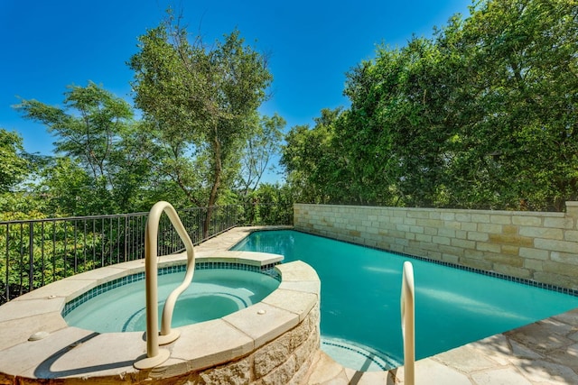 5133 Valburn Ct, Austin, TX 78731 - view of swimming pool featuring a pool with connected hot tub
