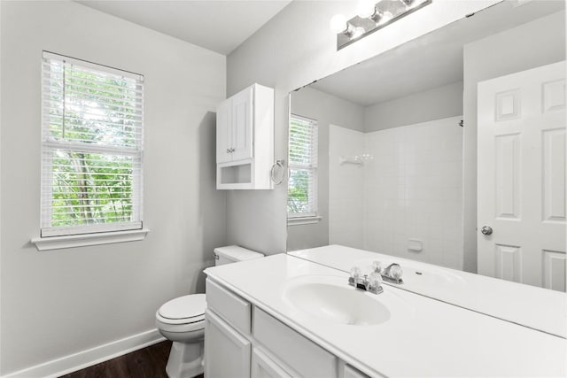 1600 Gretchen Dr, Cedar Park, TX 78613 - full bathroom featuring wood finished floors, vanity, healthy amount of natural light, and a shower