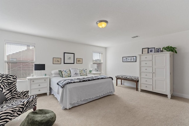 7609 Lazy Creek Dr, Austin, TX 78724 - bedroom featuring light colored carpet