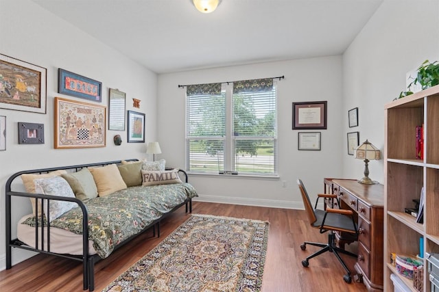 7609 Lazy Creek Dr, Austin, TX 78724 - office area featuring wood finished floors and baseboards