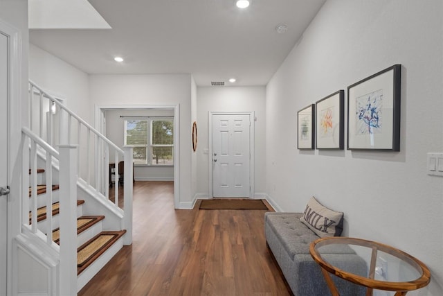 7609 Lazy Creek Dr, Austin, TX 78724 - entrance foyer featuring stairway, wood finished floors, and recessed lighting