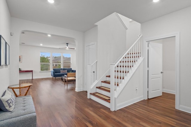 7609 Lazy Creek Dr, Austin, TX 78724 - stairs featuring wood finished floors, recessed lighting, ceiling fan, and arched walkways