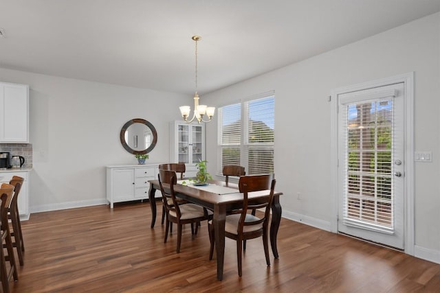 7609 Lazy Creek Dr, Austin, TX 78724 - dining room featuring a chandelier and dark wood finished floors