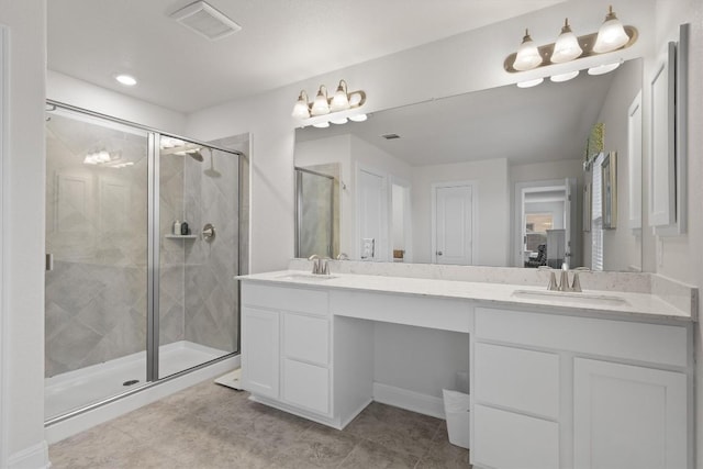7609 Lazy Creek Dr, Austin, TX 78724 - bathroom featuring double vanity and a shower stall