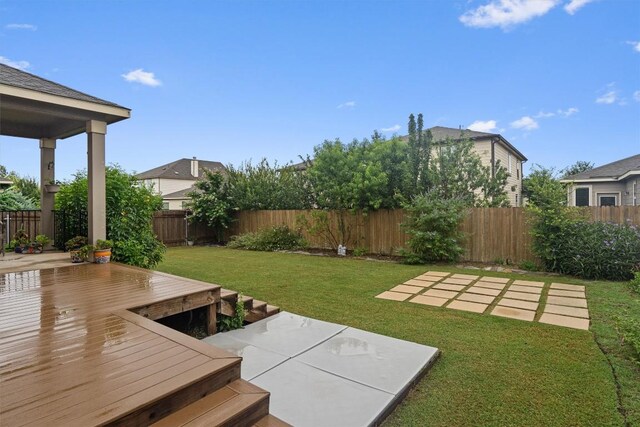 7609 Lazy Creek Dr, Austin, TX 78724 - fenced backyard with a patio area and a wooden deck