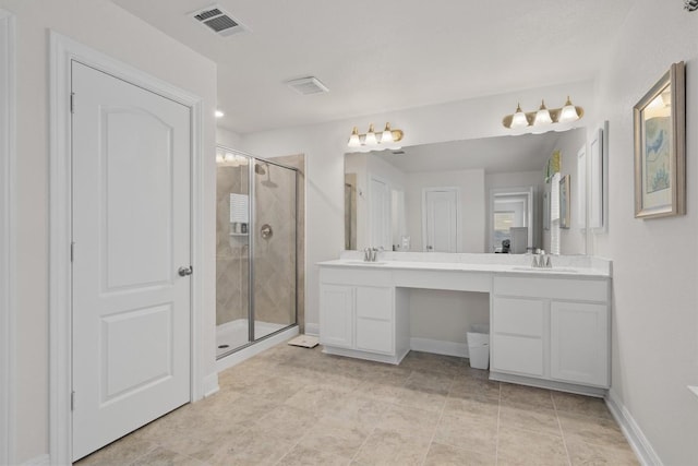 7609 Lazy Creek Dr, Austin, TX 78724 - full bathroom with double vanity, a shower stall, and tile patterned floors