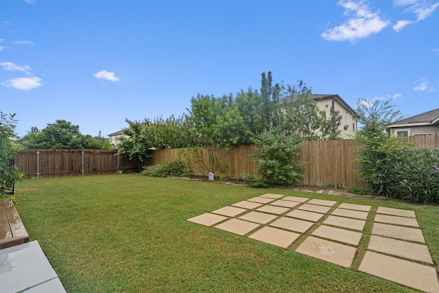7609 Lazy Creek Dr, Austin, TX 78724 - fenced backyard with a patio area