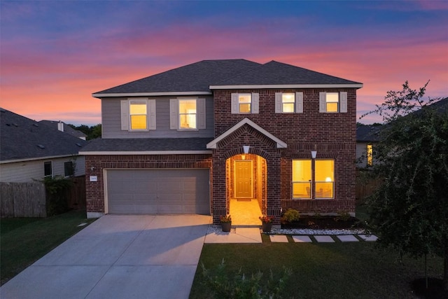 7609 Lazy Creek Dr, Austin, TX 78724 - traditional-style house featuring brick siding, a garage, concrete driveway, and a shingled roof