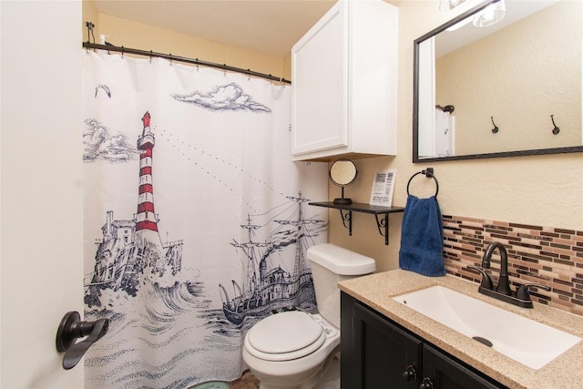 12 Catalpa Ct, Belton, TX 76513 - full bathroom with tasteful backsplash, vanity, toilet, and a shower with shower curtain