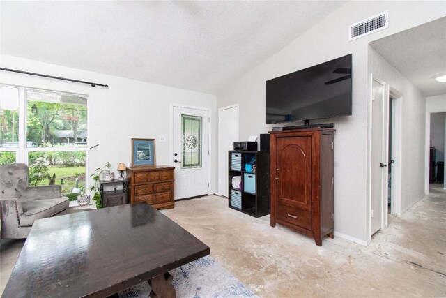 12 Catalpa Ct, Belton, TX 76513 - home office featuring concrete floors, lofted ceiling, and baseboards