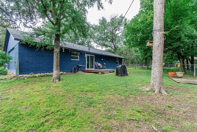 12 Catalpa Ct, Belton, TX 76513 - rear view of property featuring a deck and brick siding